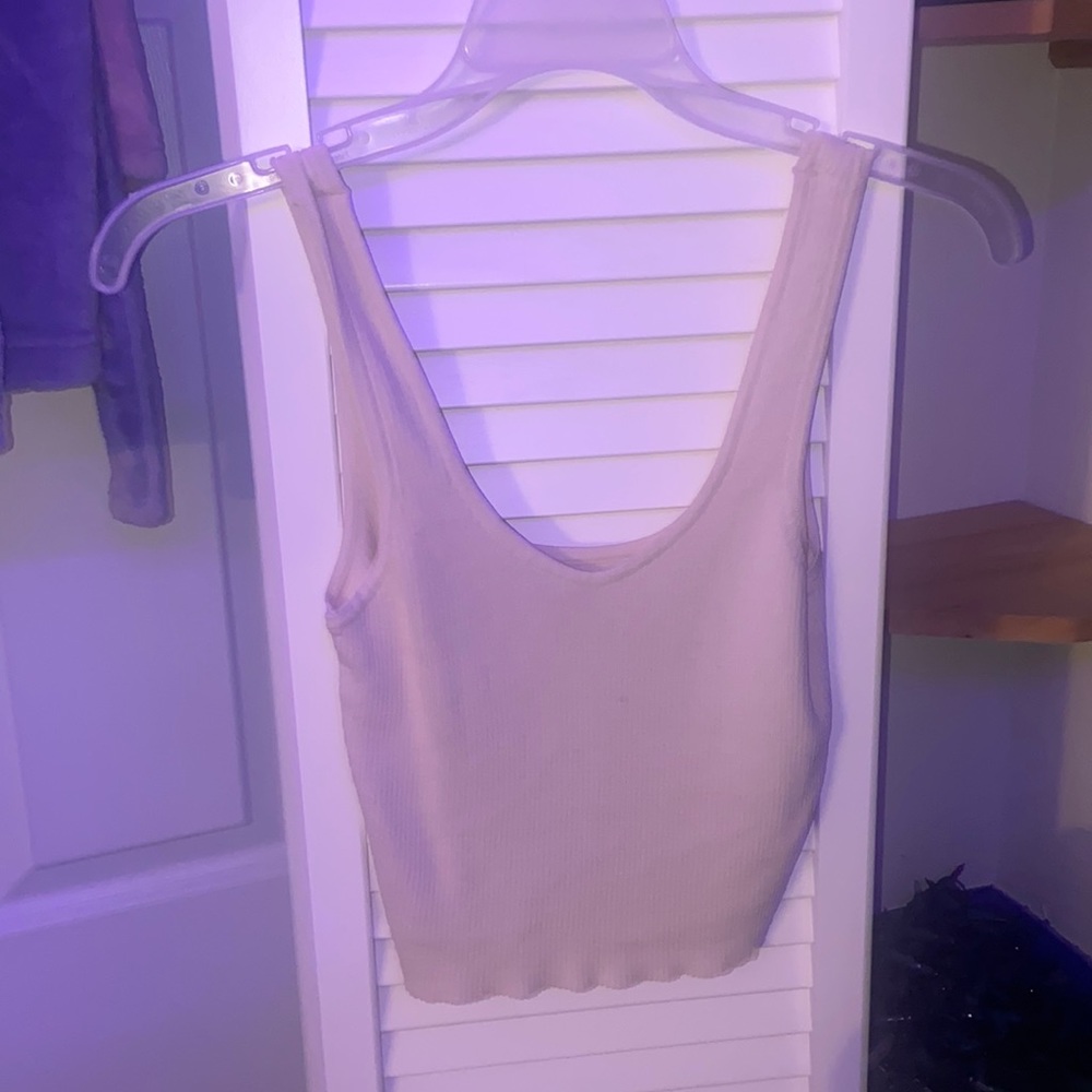 Cute loose crop top perfect for summer, and a swim suit cover up. Size small